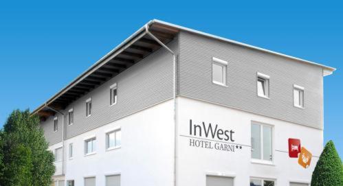 Inwest Hotel Garni Крайльсгайм Екстер'єр фото